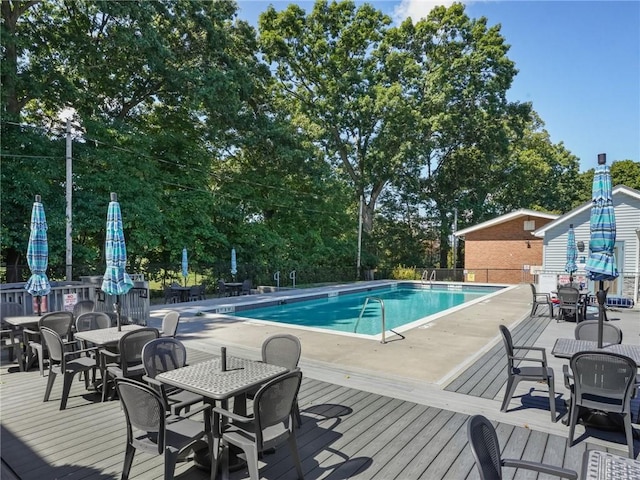 view of pool with a deck