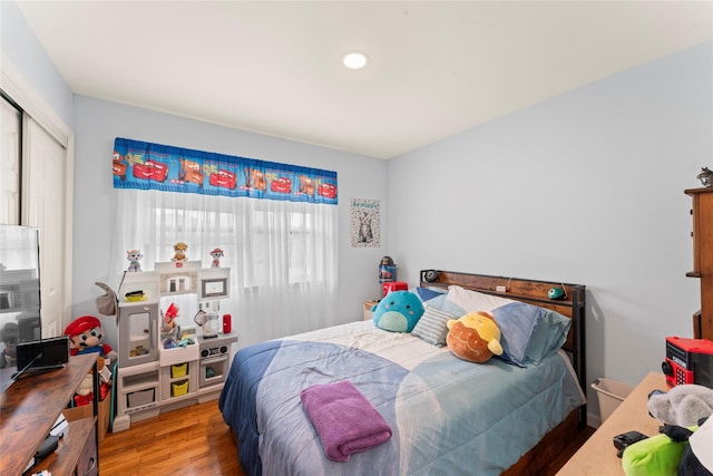 47 Riverside Rd, Newtown, CT 06482 - bedroom with wood finished floors and a closet