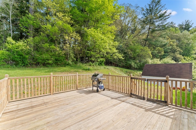47 Riverside Rd, Newtown, CT 06482 - wooden deck with a grill