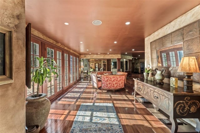 interior space featuring wood-type flooring and french doors