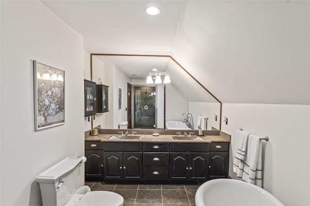 full bathroom with shower with separate bathtub, vanity, toilet, and lofted ceiling