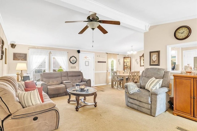 carpeted living room with beam ceiling, ceiling fan with notable chandelier, and crown molding