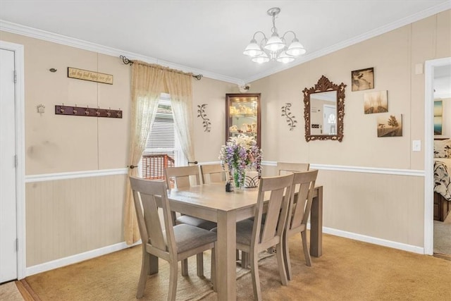 carpeted dining space featuring a notable chandelier and crown molding