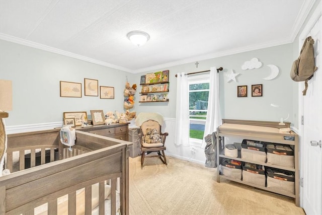 bedroom featuring light carpet, a textured ceiling, and crown molding