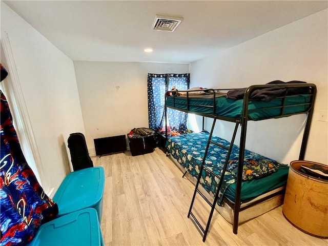 bedroom featuring wood-type flooring