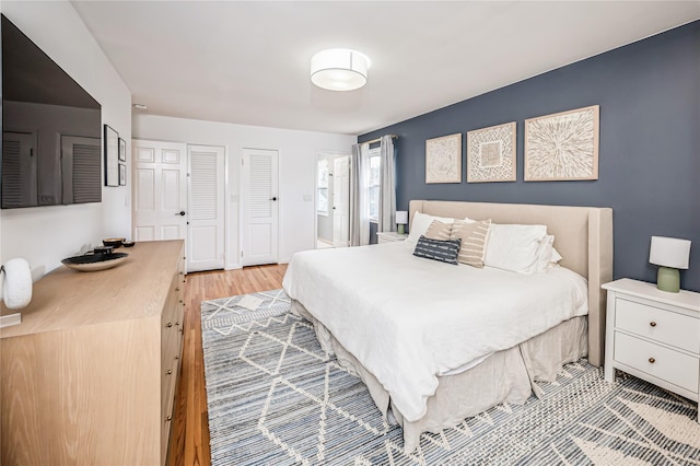 bedroom with light wood-style flooring