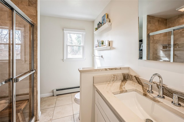 bathroom with tile patterned flooring, toilet, a stall shower, vanity, and a baseboard radiator