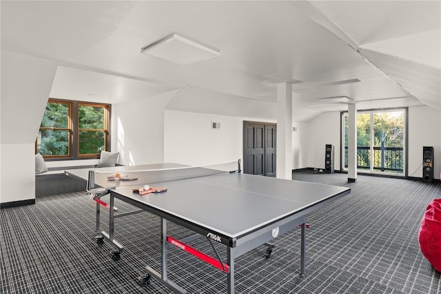 playroom featuring carpet floors and lofted ceiling