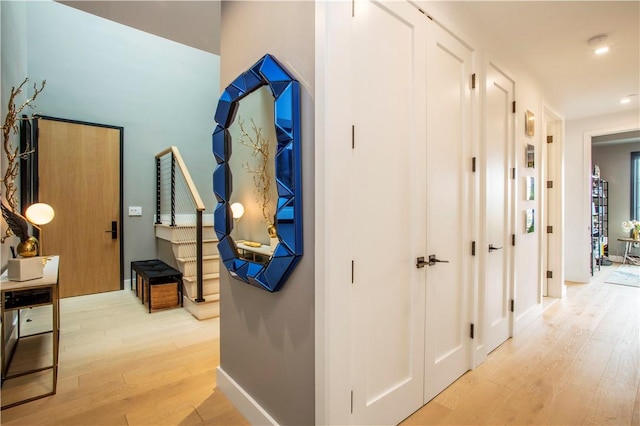 hallway featuring light wood-type flooring