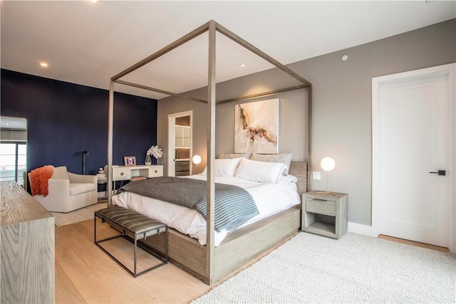 bedroom featuring light hardwood / wood-style floors