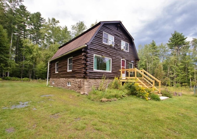 733 Braden Rd, Greenfield Park, NY 12435 - view of side of home featuring a gambrel roof, log siding, and a yard