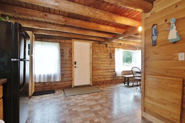 entryway with beam ceiling and wooden ceiling