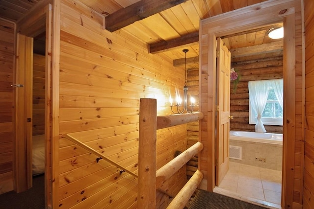 733 Braden Rd, Greenfield Park, NY 12435 - corridor featuring wood ceiling with exposed beams, rustic walls, and tile patterned flooring