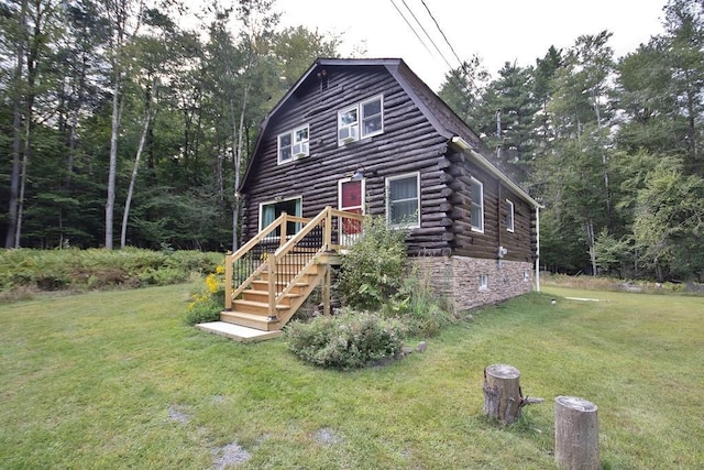 733 Braden Rd, Greenfield Park, NY 12435 - log cabin featuring log siding, a front yard, and a gambrel roof