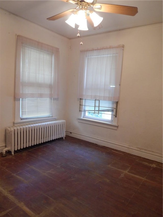 empty room featuring ceiling fan