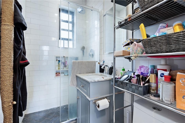 bathroom with vanity and walk in shower