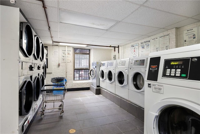 2115 33rd St Unit 4E, Astoria, NY 11105 - communal laundry room featuring separate washer and dryer and tile patterned flooring