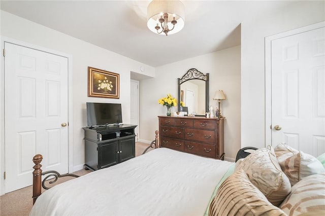 bedroom with light carpet