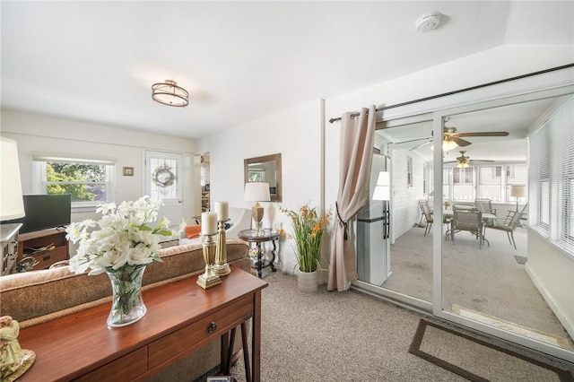 living room featuring ceiling fan