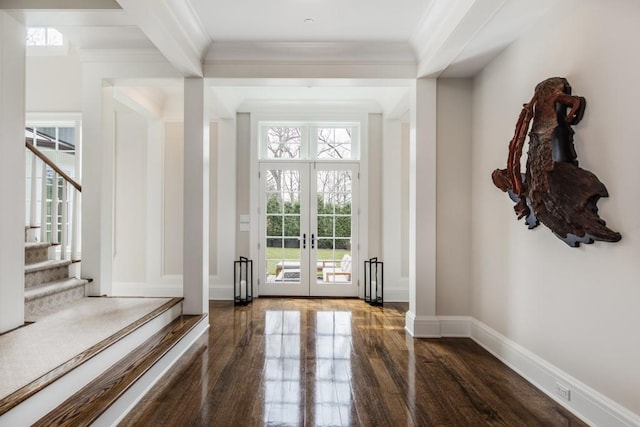 doorway to outside with french doors, ornamental molding, and dark wood-type flooring