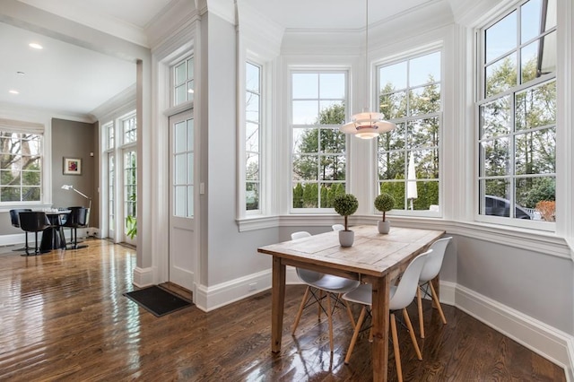 sunroom / solarium featuring a healthy amount of sunlight