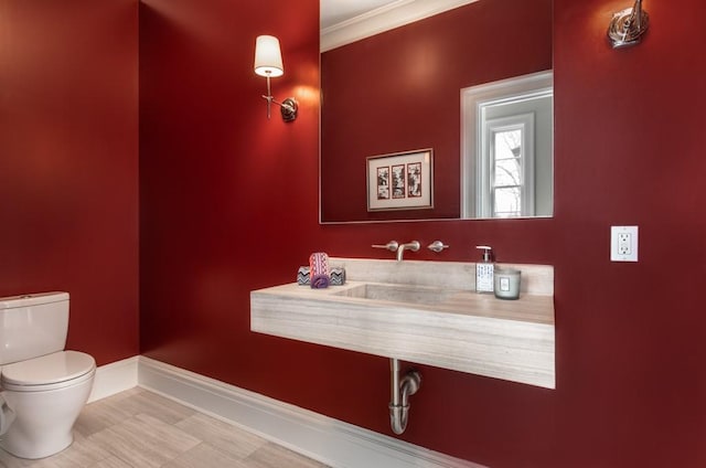 bathroom with sink and toilet