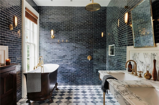 bathroom featuring vanity and separate shower and tub