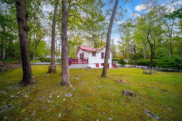 view of yard featuring a deck