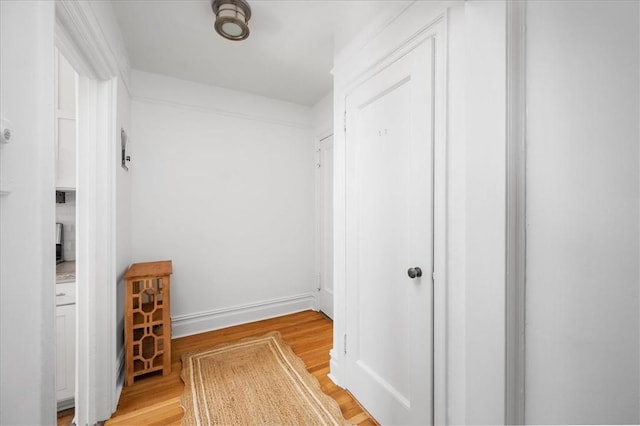 hallway featuring light hardwood / wood-style floors