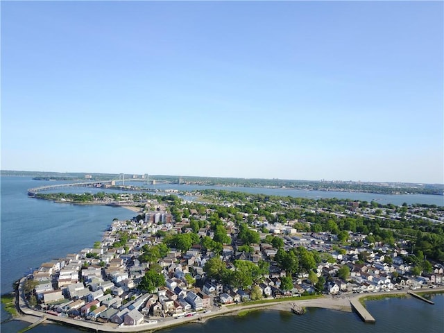 birds eye view of property featuring a residential view and a water view