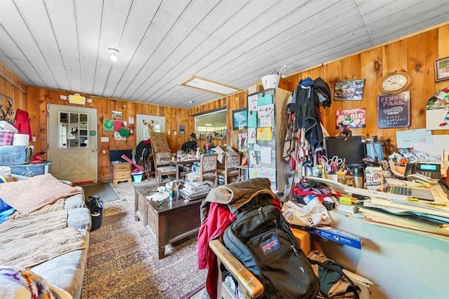 miscellaneous room with wooden walls and wood ceiling