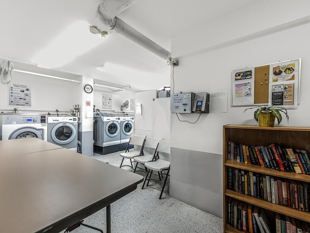 washroom featuring washer and dryer