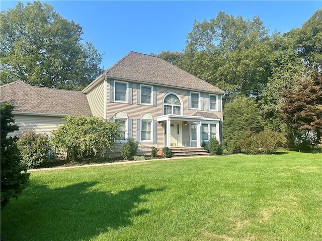 98 Pelham Dr, Cornwall, NY 12518 - colonial-style house featuring a shingled roof and a front yard