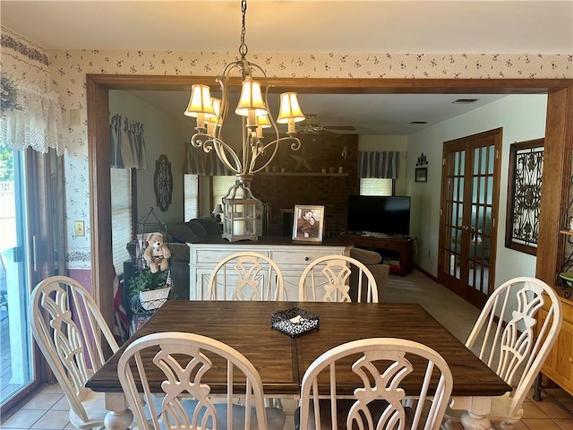 98 Pelham Dr, Cornwall, NY 12518 - dining room featuring an inviting chandelier, light tile patterned flooring, french doors, and visible vents