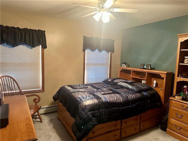 98 Pelham Dr, Cornwall, NY 12518 - bedroom with a baseboard radiator, ceiling fan, and light colored carpet