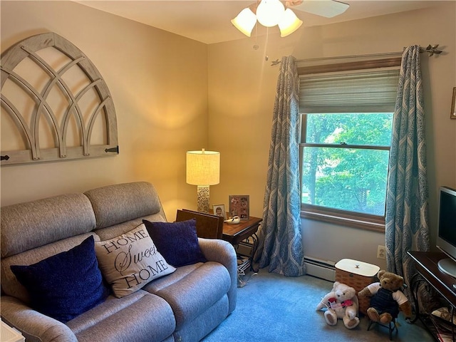 98 Pelham Dr, Cornwall, NY 12518 - living room featuring carpet flooring, ceiling fan, and a baseboard heating unit