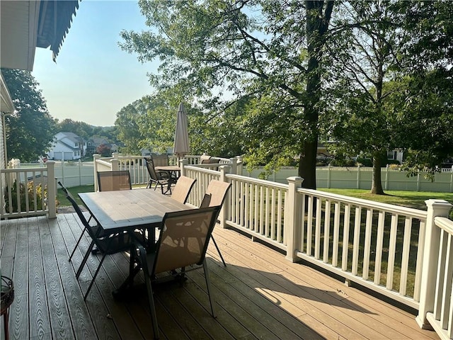 98 Pelham Dr, Cornwall, NY 12518 - wooden terrace with outdoor dining area, a fenced backyard, and a yard
