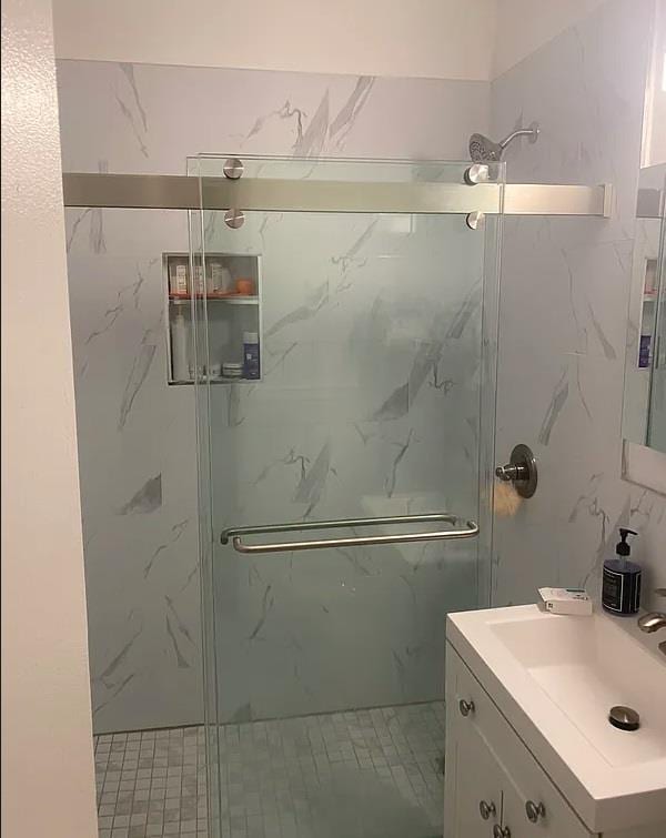 3216 31st Ave, Astoria, NY 11106 - full bath with vanity and a marble finish shower