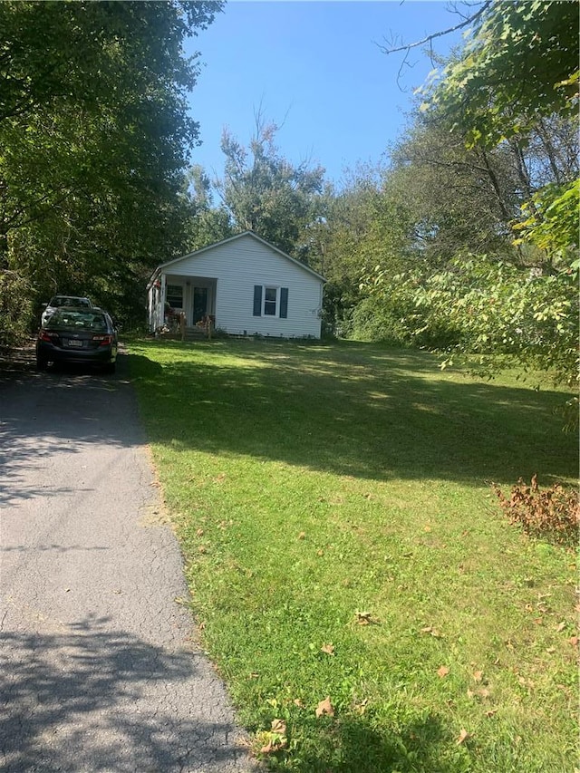 exterior space with a lawn