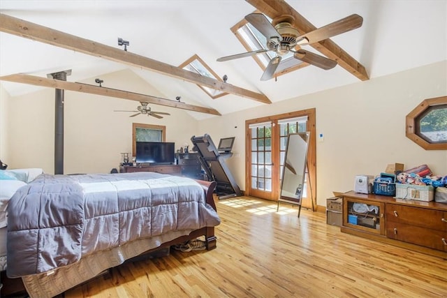 bedroom featuring beam ceiling, light wood-type flooring, high vaulted ceiling, and french doors