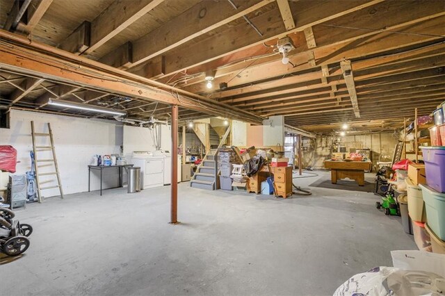 basement with billiards and washing machine and clothes dryer