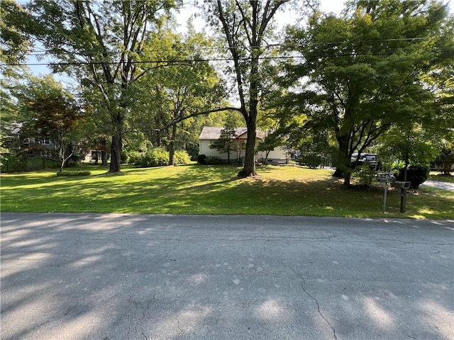 exterior space featuring a front yard