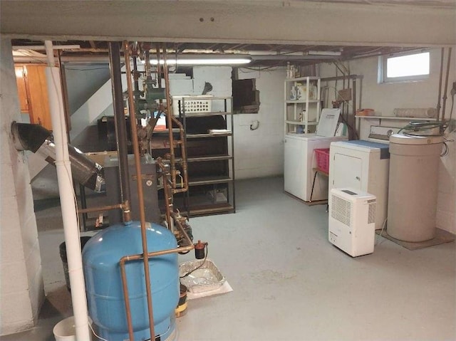 basement featuring washer and clothes dryer