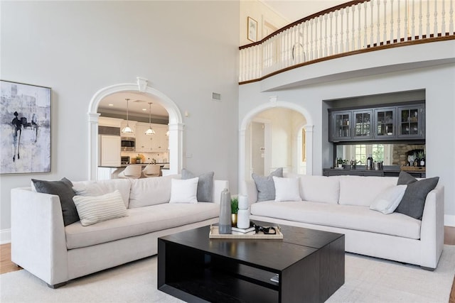 778 Sleepy Hollow Rd, Briarcliff Manor, NY 10510 - living area with arched walkways and a high ceiling