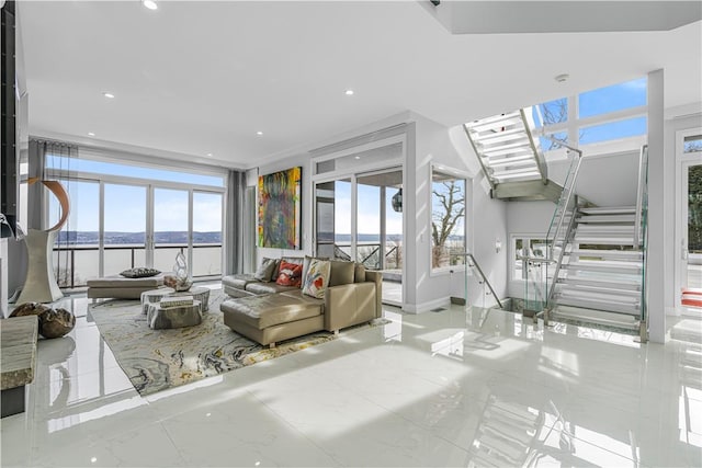 living room featuring a water view