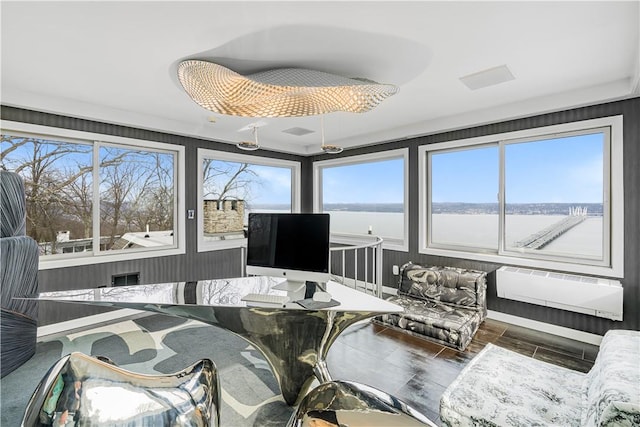 sunroom / solarium with a wall unit AC