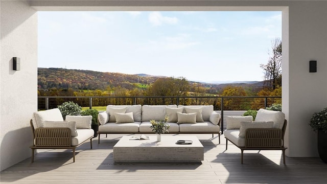 deck featuring a mountain view and an outdoor living space