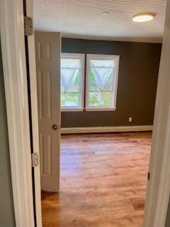 hall featuring light hardwood / wood-style floors