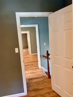 hallway featuring light hardwood / wood-style floors