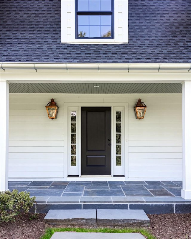 doorway to property with a porch